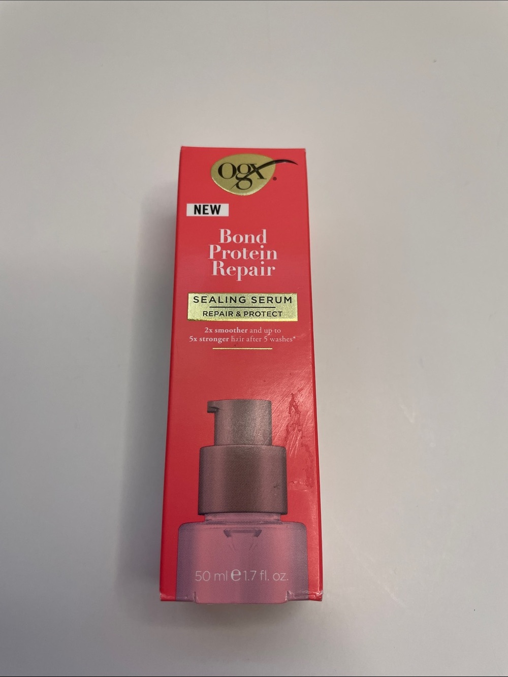 NIB OGX Bond Protein Repair Sealing Serum.